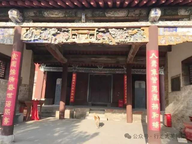 A scenic view of Luliang Baicaopo Longtian Tudi Temple