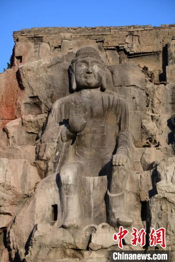 A scenic view of Luliang Shushi Fo Cliff Statue
